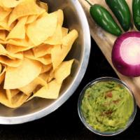 Homemade Chips and Guacamole · Fresh made Lime Salt Corn chips, accompanied with fresh made Guacamole