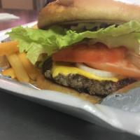 Big Boy Burger · A succulent ground beef patty, seasoned to perfection, topped with crispy lettuce, ripe toma...