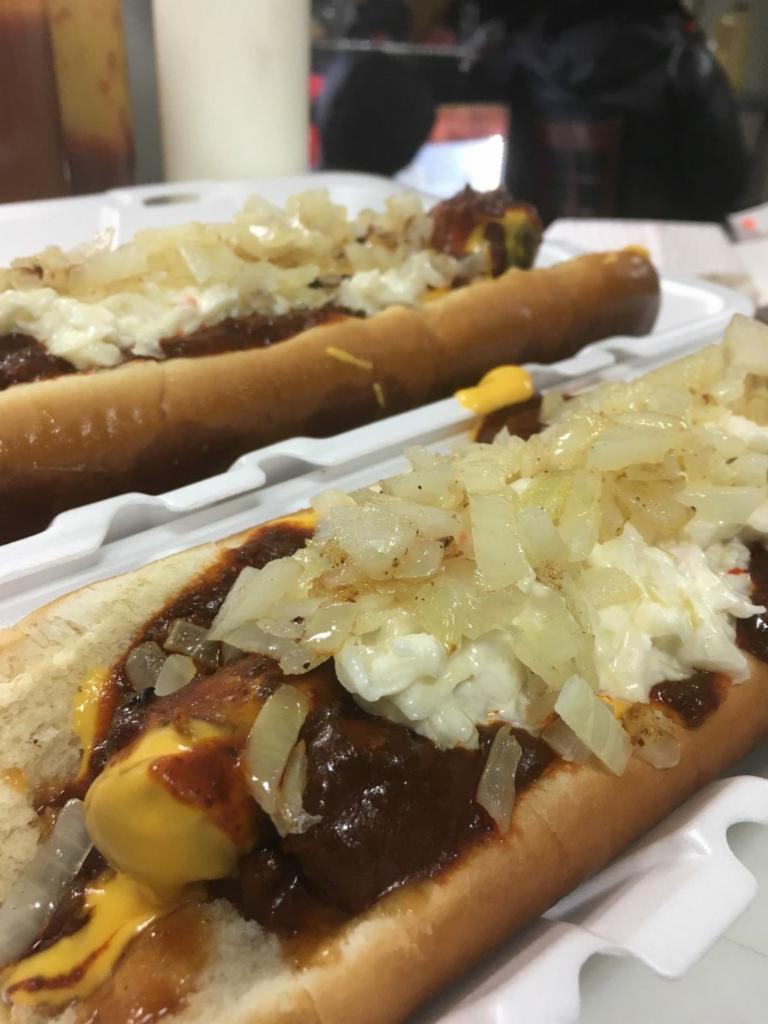 The Big John  · A juicy, jumbo pork sausage, topped with Cole slaw and BIG Dave's signature sauce, on a buttery toasted foot long bun.