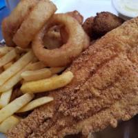 The Big Catch Fish · Hand-battered catfish fillets, fried to crispy perfection, served with coleslaw, hush puppie...