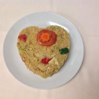 78. Curry Fried Rice · Stir fried rice with choice of meat, carrots, bell peppers, eggs, onions and basil with choi...