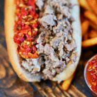 Cheesesteak Hoagie · Steak, grilled onions and white American Swiss blended cheese. Add spicy cherry peppers or m...