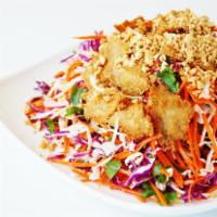 Paradise Salad with Chickless  · Crispy tofu. Purple cabbage, green cabbage, carrots, lettuce, cilantro, mixed with our homem...