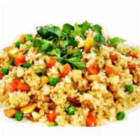 Blissful Fried Rice · White rice, vegan ham, crispy protein bits, tofu, peas and carrots, onions, cilantro, our ho...