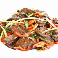 Mongolian Wonder · BBQ beefless protein, yellow onions, red and green bell peppers sauteed in our homemade savo...