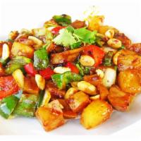 Kung Pao Tofu  · Crispy tofu, yellow onions, red and green bell peppers, broccoli, peanuts , pineapple sautee...