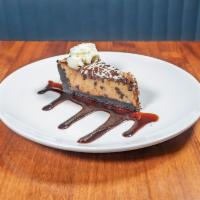 Reeseʼs Peanut Butter Pie · Filled with Peanut Butter and Chocolate Mousses, Chocolate Chips, Peanuts, and Reese's Peanu...