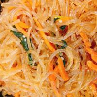 Japchae · Gluten free stir fried glass noodles (Sweet potato) with onions, spinach, and carrots.