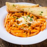 Penne and Grilled Chicken a la Vodka · Penne pasta simmered in a creamy vodka sauce topped with our tender grilled chicken breast s...