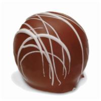Rum Truffle · Our gourmet chocolates never tasted so amazing.  A creamy rum flavored ganache center (non-a...