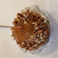 Pecan Caramel Apple · a Granny Smith apple covered in fresh caramel and rolled in chopped pecans.