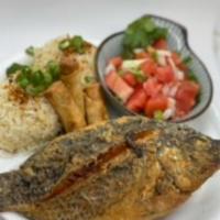 Fried whole Tilapia Combo  · Lightly Floured Whole Fried Tilapia served with 3 pcs Egg Roll and rice