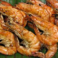 Grilled Shrimp · Whole grilled shrimp seasoned with a soy butter sauce -12 Pcs
