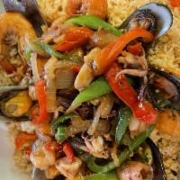Seafood Fried Rice ( A Seafood Lovers Dream ) · Fried rice topped with mussels, scallops, shrimp, squid, and fried garlic.