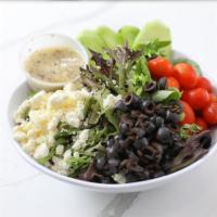 Greek Salad · Mixed greens, topped with black olives, cherry tomatoes, cucumbers, and feta cheese. Served ...