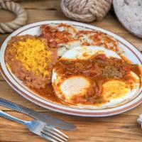 Huevos Rancheros · Eggs ranchero style, beans with cheese, hash browns, and tortillas.