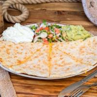 Chicken Quesadilla · Grilled flour tortilla filled with chicken, melted mozzarella and cheddar cheese. 