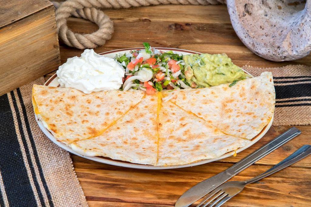 Chicken Quesadilla · Grilled flour tortilla filled with chicken, melted mozzarella and cheddar cheese. 