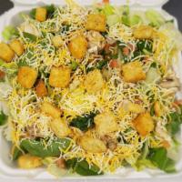 House Specialty Salad · Romaine, iceberg lettuce blend with tomato, onion, green pepper, mushroom, croutons and ched...