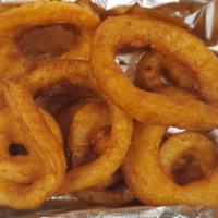 Onion Rings · 1/2 lb. of beer battered onion rings fried till golden brown and served with ranch dipping s...