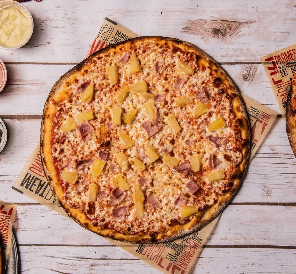 Hawaiian Pizza · Hawaiian pizza is a pizza topped with tomato sauce, cheese, pineapple and ham.