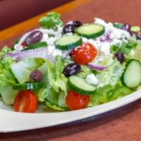 Greek Salad · Romaine lettuce, feta, red onions, cucumbers, Kalamata olives, cherry tomatoes and green pep...