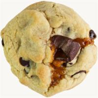 Caramel Candy Stuffed Cookies · Our chocolate chip cookie stuffed with Ocho chocolate caramel candy