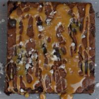 Caramel Brownie · One of our most sought after baked goods! Our rich brownie square, drizzled with our natural...