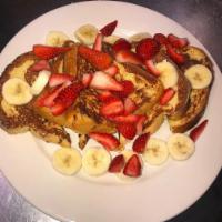 Stuffed French Toast Breakfast · Texas toast stuffed with cream cheese and choice of fruit.
