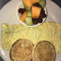 Veggie Omelette Breakfast · Broccoli, zucchini, squash, green peppers, tomatoes and provolone cheese. Served with home f...