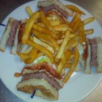 East Side Triple Decker Burger · Angus handmade 6 oz. hamburger, crisp bacon, lettuce, tomato, mayo, cheese, pickles and fries.