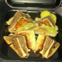 East Side Triple Decker Sandwich · Rare roast beef, crisp bacon, lettuce, tomato, mayo, pickles and fries.