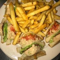 Club Sandwich · Choice of tuna, chicken salad, roasted turkey or Hormel ham and cheese with french fries.
