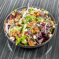 Cranberry Walnut Salad · Spinach, cranberry, orange supreme, red onion, goat cheese, candied walnut with white balsam...