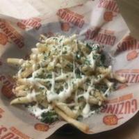 Italian Fries · Fries tossed with fresh garlic and herbs, topped with aa blend of cheeses.