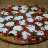 Margherita Pizza · Fresh mozzarella, fresh basil, imported Parmesan cheese and sauce.
