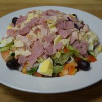 Chopped Chef Salad · Blend of lettuce, tomatoes, cucumbers and hardboiled egg topped with turkey, provolone chees...
