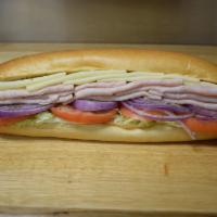 Turkey and Cheese Sub · Sliced oven roasted turkey, provolone cheese, lettuce, tomatoes, onions and oil.