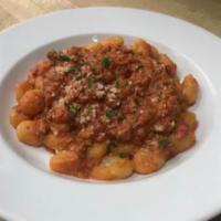 Gnocchi Bolognese · Potato gnocchi topped with our homemade meat sauce with a touch of cream