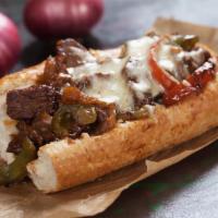 Philly Cheesesteak · Served on an authentic roll. Your choice of a half pound of steak or chicken cheesesteak wit...