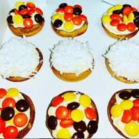Box of Mini Donuts · Box of homemade mini donuts. Your choice in frosting flavors and toppings.