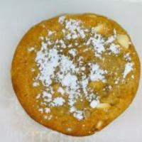 White Macadamia Nut · Homemade White Macadamia nut cookie. Dusted with sugar upon request.