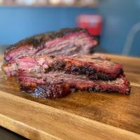 Beef Brisket Meat · 10 hours slow-cooked brisket (flat & point) with house-made dry rubs. Two BBQ sauce and a br...