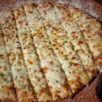 Famous Asiago Cheese Bread · Tony’s favorite, Garlic Olive Oil Glaze, 3 Cheeses, golden baked and served with Classic Red...