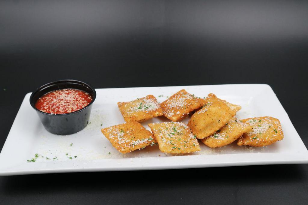 Toasted Ravioli* · Italian Cheese Filled Ravioli, lightly breaded. Served with Classic Red Sauce
