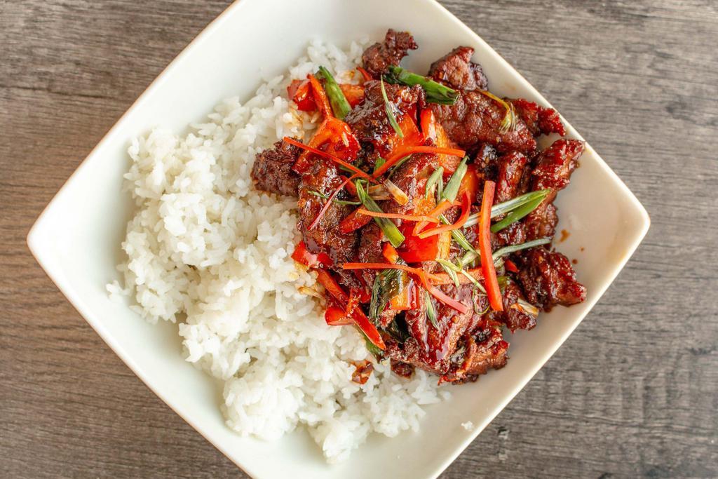Spicy Garlic Beef with Scallions Bowl · Spicy caramelized beef with scallions, garlic and bell peppers.