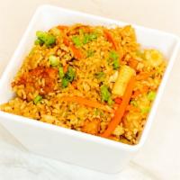 Fried Rice · Classic fried rice served with carrots, onions, and eggs. Available gluten free. Comes with ...