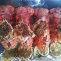 Lobster Tail Boil · 2 Lobster Tails, Comes with corn potatoe and lemon and your choice of sauce.