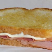 Hot Ham and Cheese Sandwich · Ham, Swiss cheese, mustard on sourdough bread. 