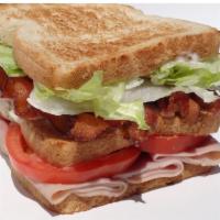 Club Sandwich · 3 slices of bread and two layers of filling.